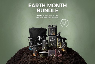 Grounded Earth Month bundle of eco-friendly household and personal care products displayed on soil
